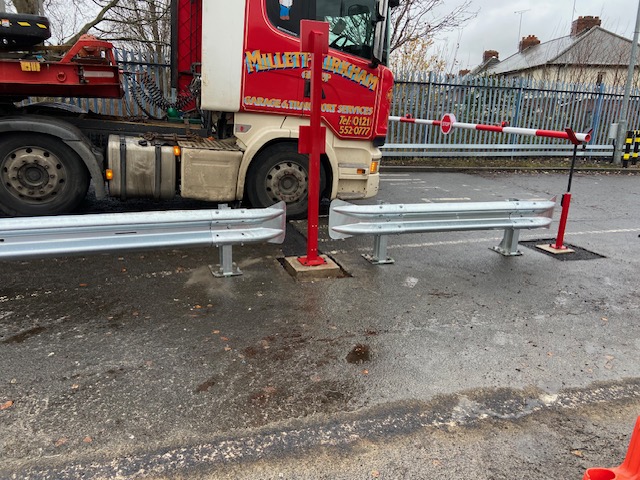 Armco barrier protecting a loading area
