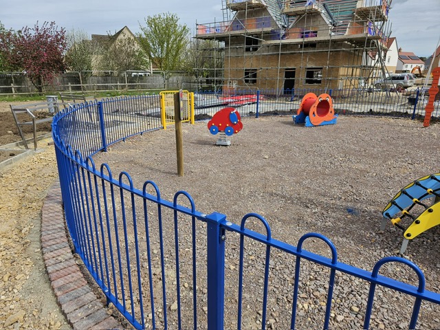 Close-up of secure mesh fencing line