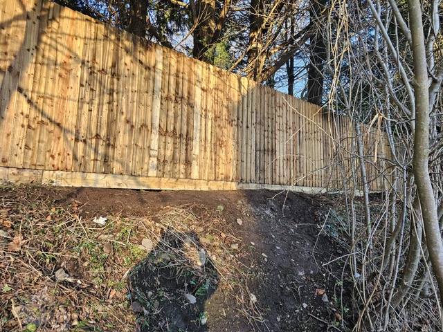 Mesh fencing around a secure site boundary