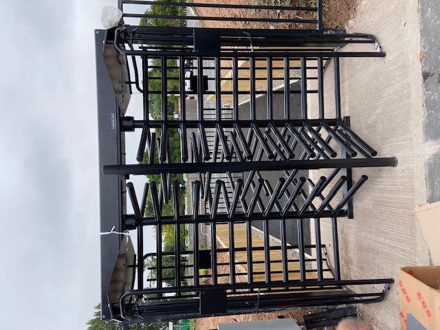Black boundary gate and railing section