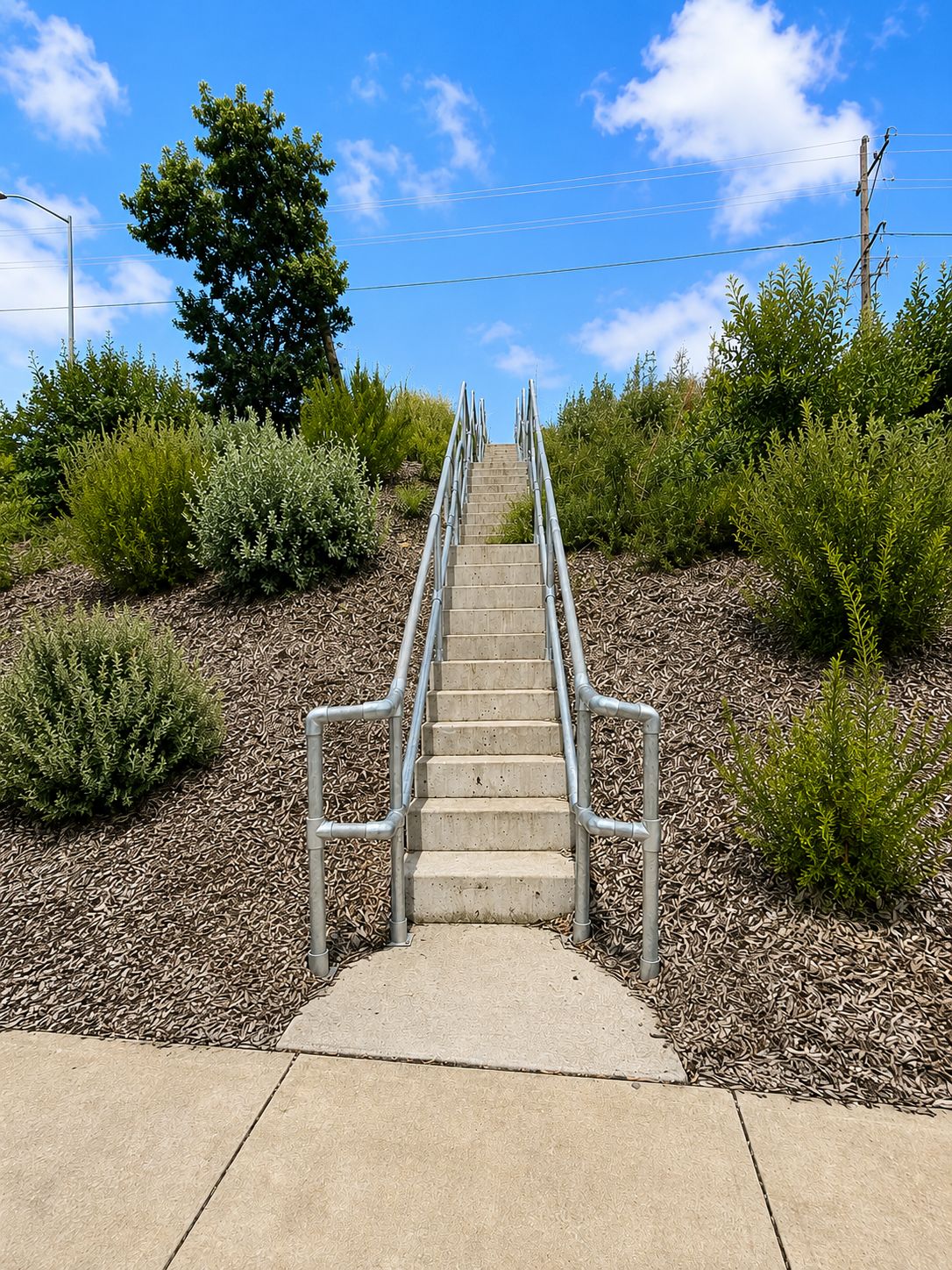Tubular guardrail protecting a roadside access area